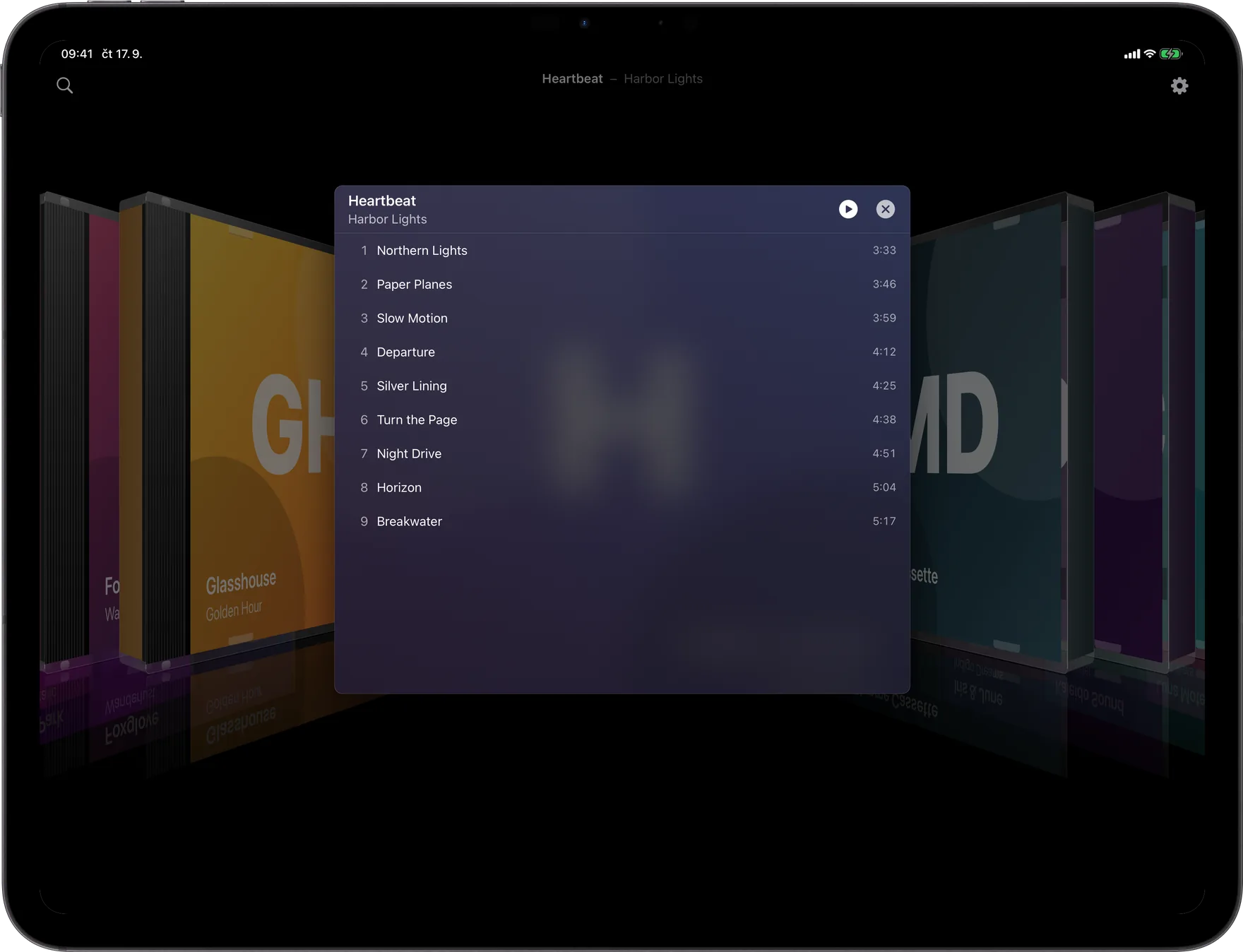 AlbumDeck: seznam skladeb alba s probíhajícím přehráváním